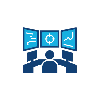 Silhouette of a person at a control desk with three monitors showing charts and a crosshair target.